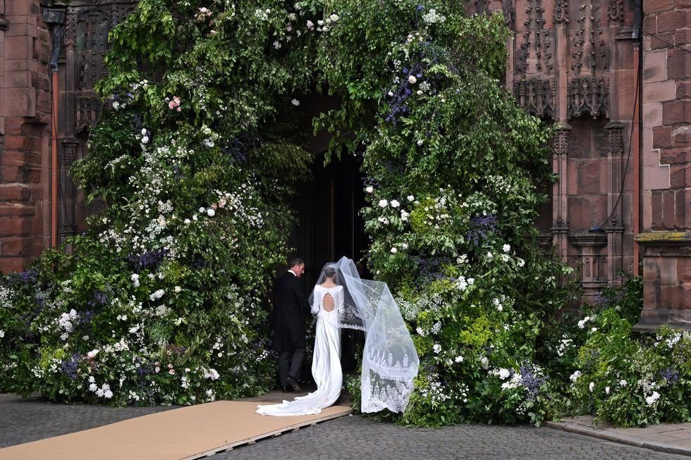 Olivia Henson arrives at the wedding of The Duke of Westminster and Miss Olivia Henson at Chester Cathedral