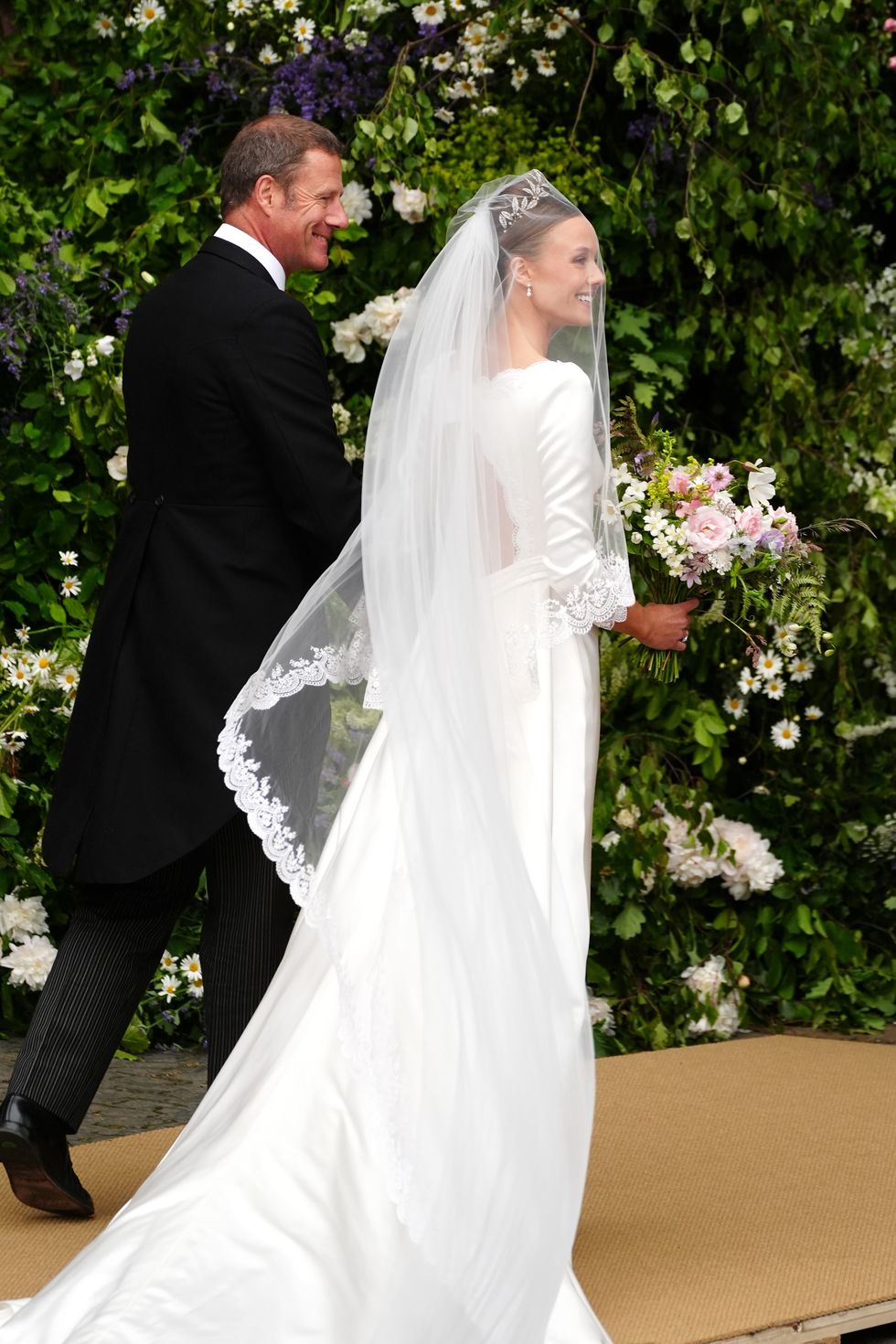 Olivia Henson arrives for her wedding to Hugh Grosvenor,