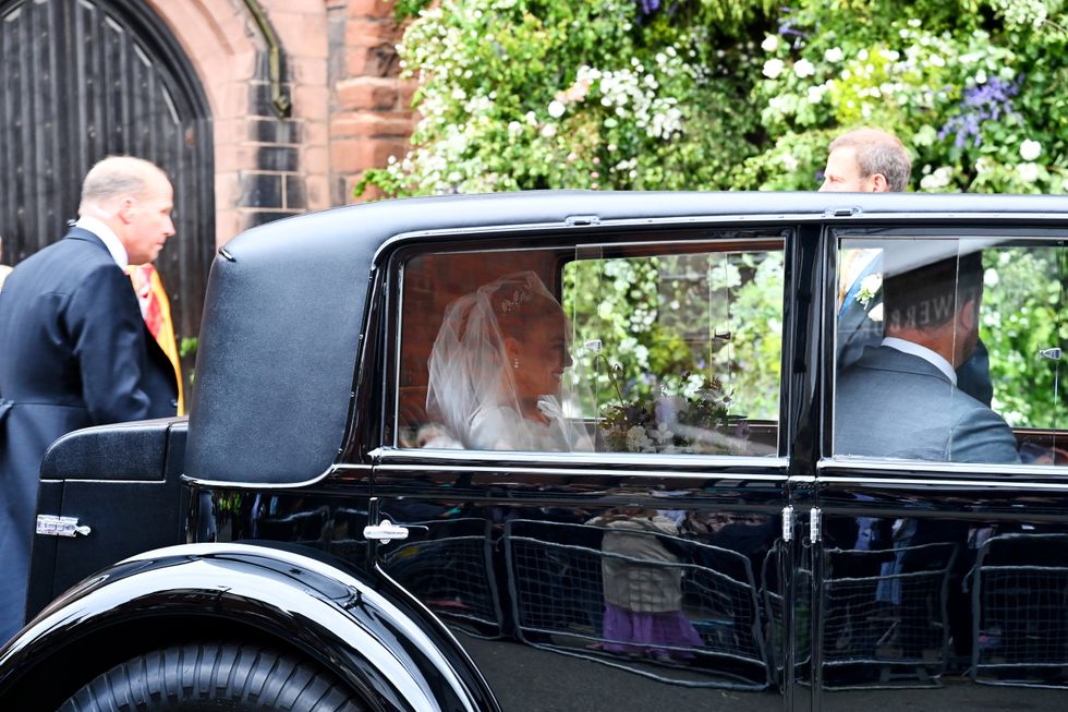 Olivia Henson is chauffeured in the Bentley Motors 1930 8-Litre to her wedding