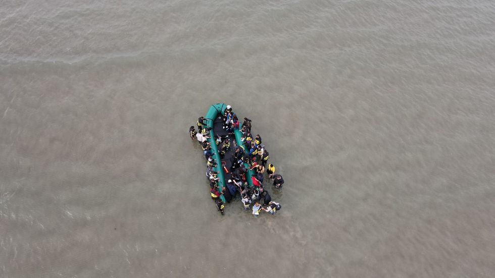 One boat being pushed into the Channel