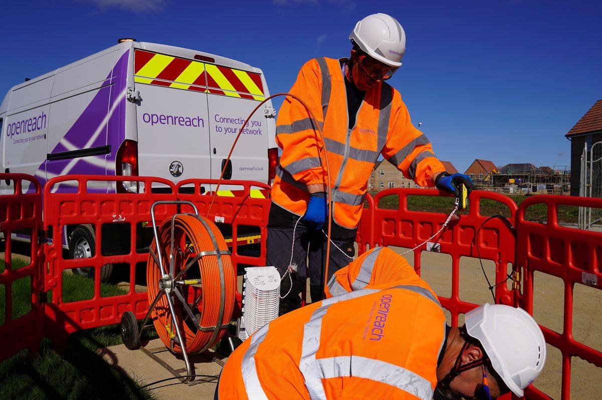 openreach engineers fitting new broadband cables underground