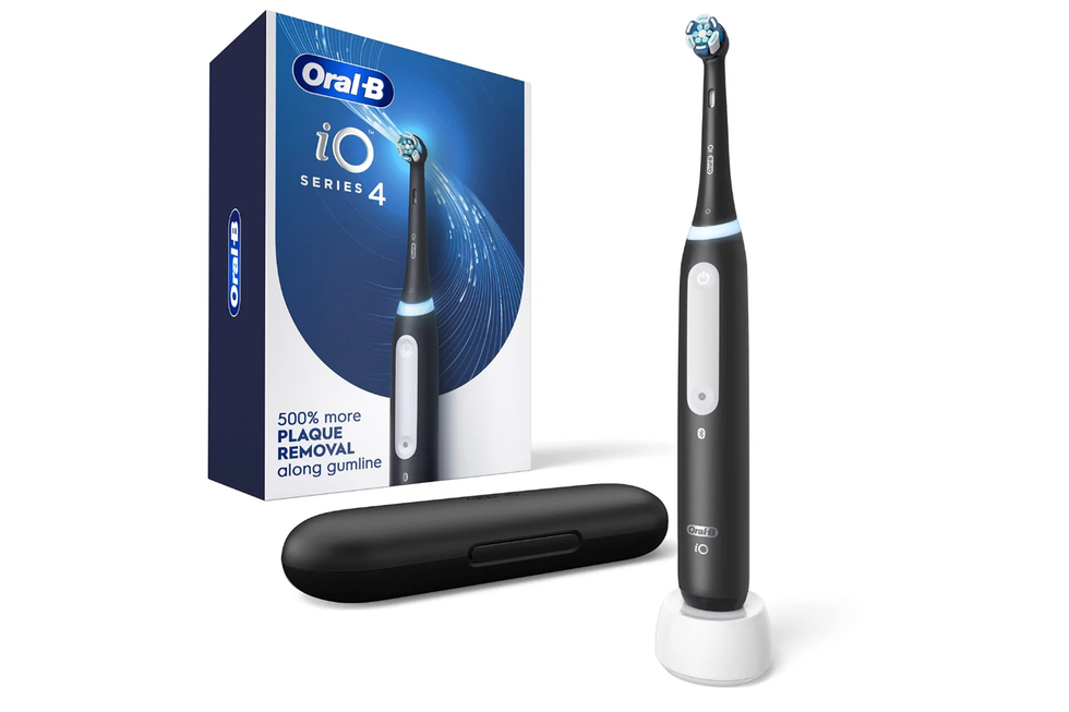 oral b io4 electric toothbrush pictured with travel case and charger