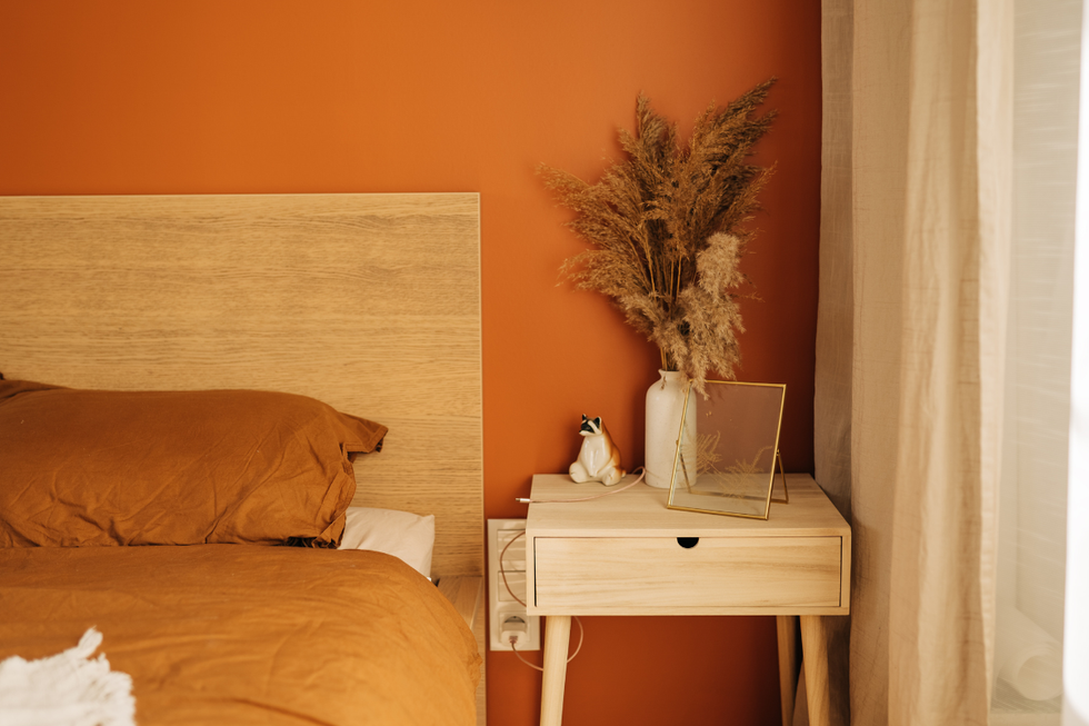 Orange bedroom with orange bedding