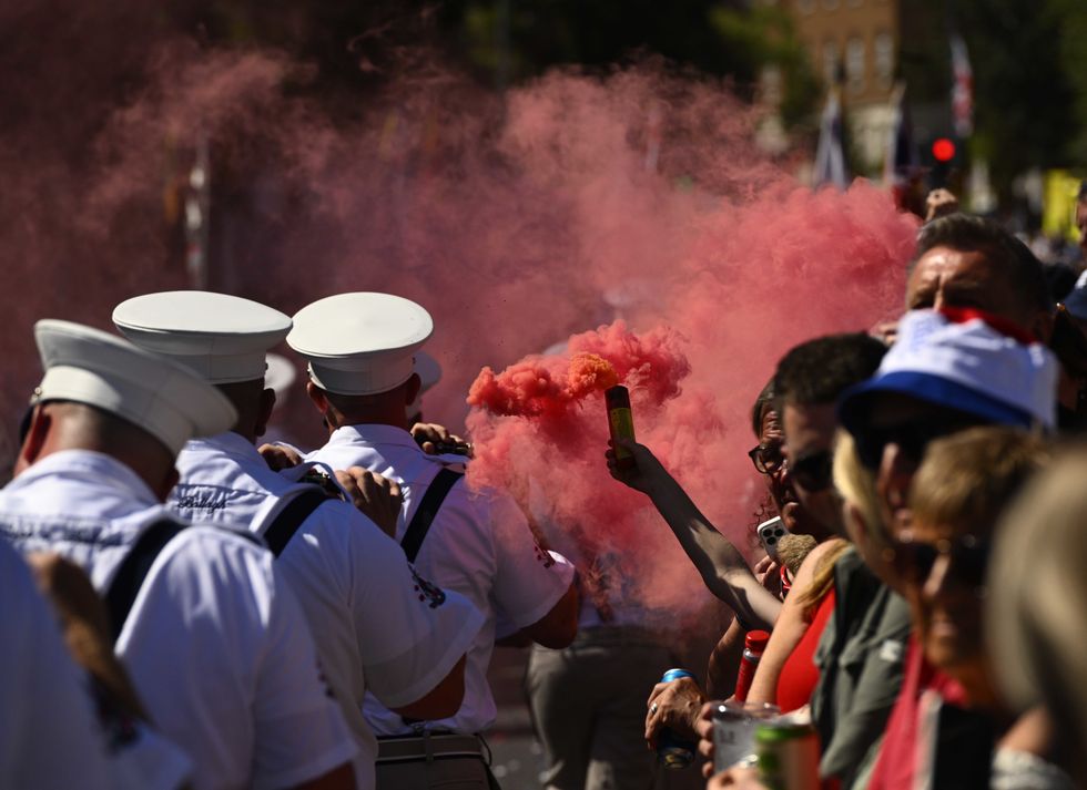 Orange pyrotechnics on the streets of Belfast as Unionists celebrate the Battle of the Boyne