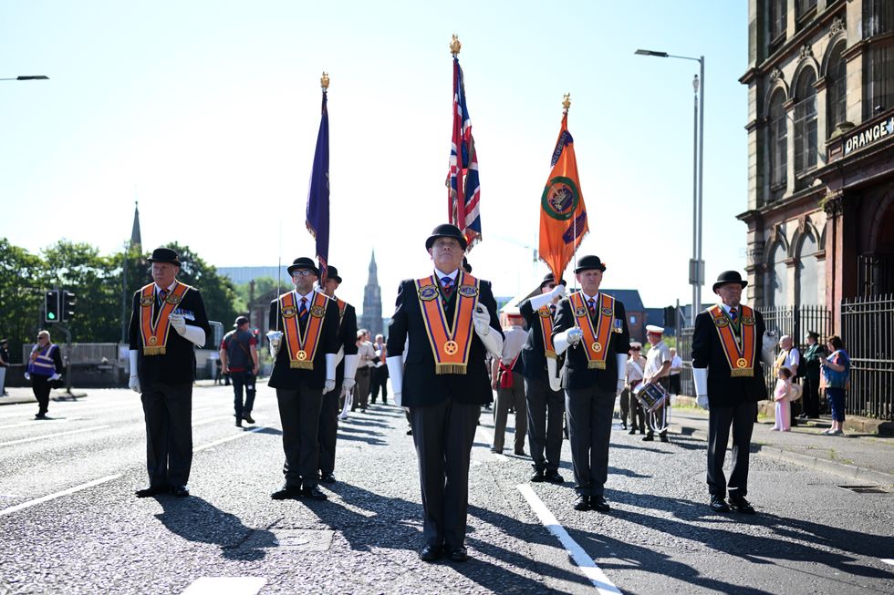 Orangemen march during the annual Twelfth of July parade on July 12, 2025 in Belfast