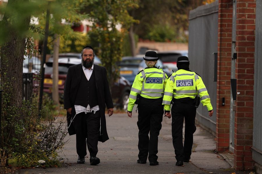 Orthodox Jew with police officers