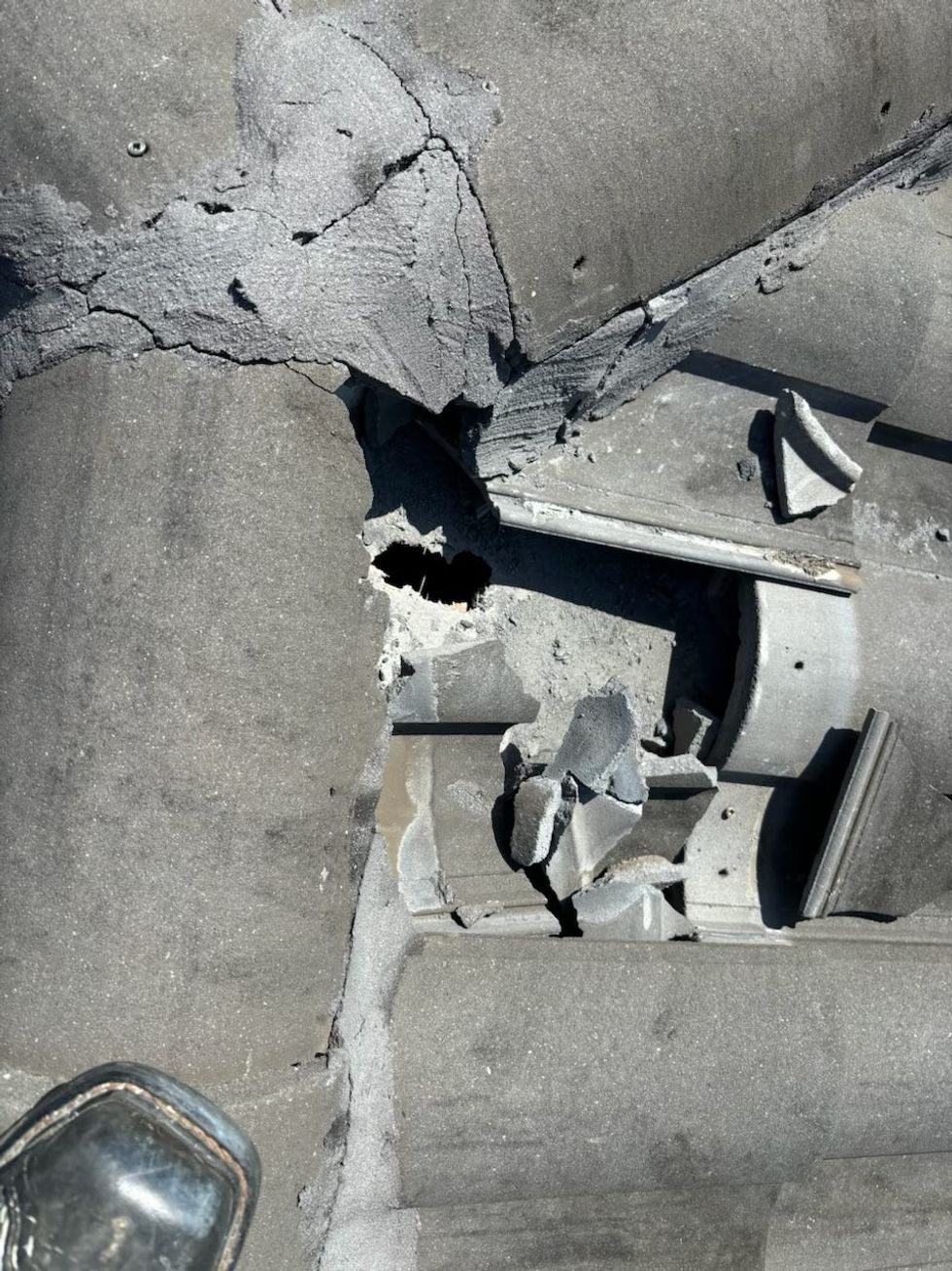 Otero's damaged roof due to the object