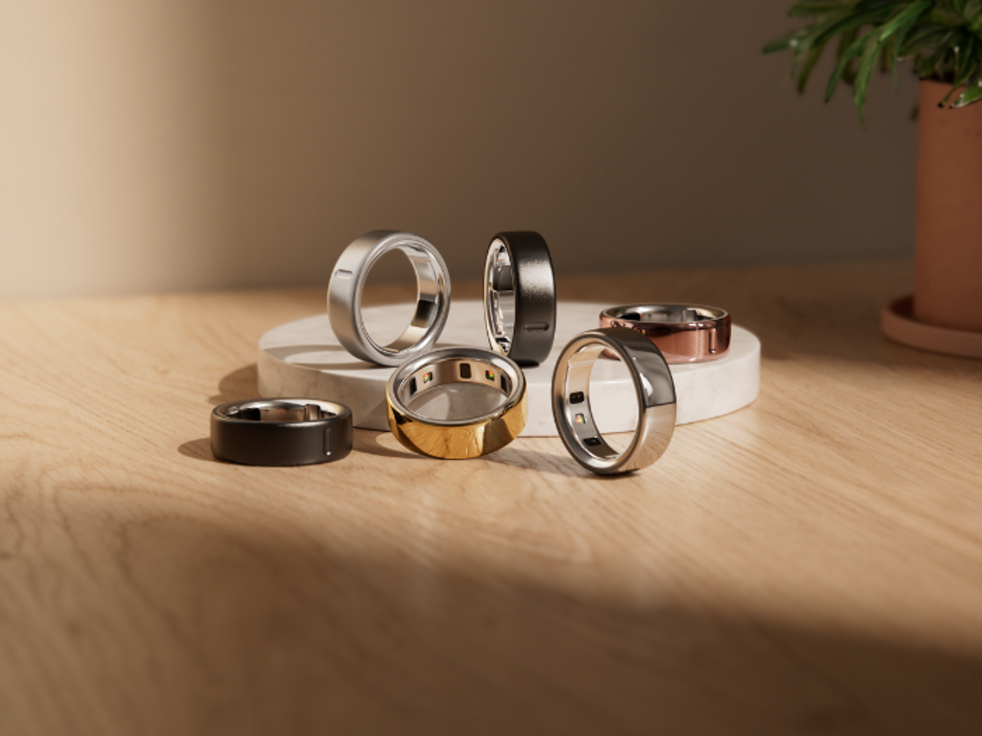 Oura Ring 4 in metallic shades on table