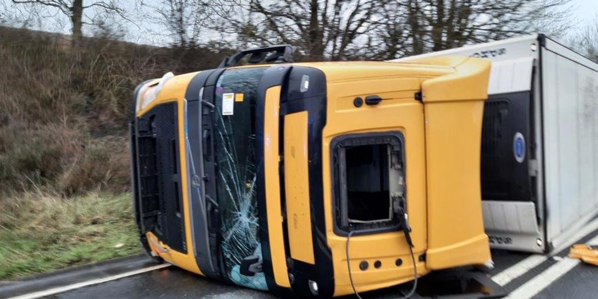 Overturned lorry prompts major road closure as emergency services deal with recovery and diesel spill Overturned lorry prompts major road closure as emergency services deal with recovery and diesel spill