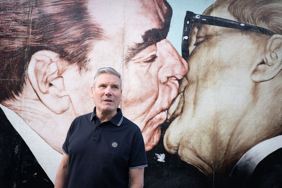 PA REVIEW OF THE YEAR 2022 File photo dated 15/07/22 - Labour leader Sir Keir Starmer walks past a section of the Berlin Wall known as the East Side Gallery in Berlin on the second day of his two day visit to the German capital. Later he will meet with the Chancellor, Olaf Scholz at The Federal Chancellery. Issue date: Tuesday December 20, 2022.