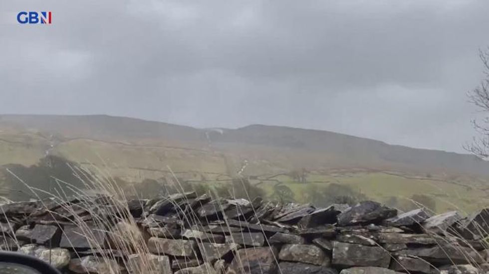Storm Dudley wreaks havoc across Britain bringing 90mph winds and blizzards