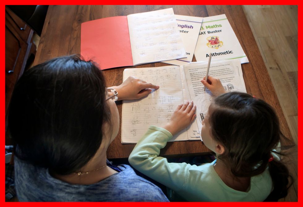 PABest A child is homeschooled after Prime Minister Boris Johnson has put the UK in lockdown to help curb the spread of the coronavirus.