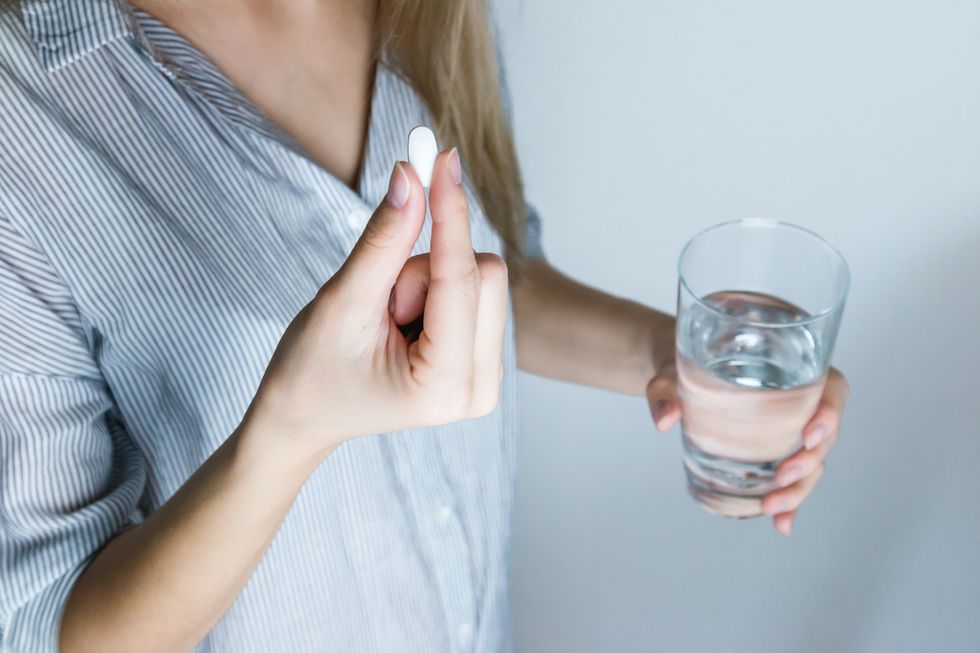 painkiller in hand