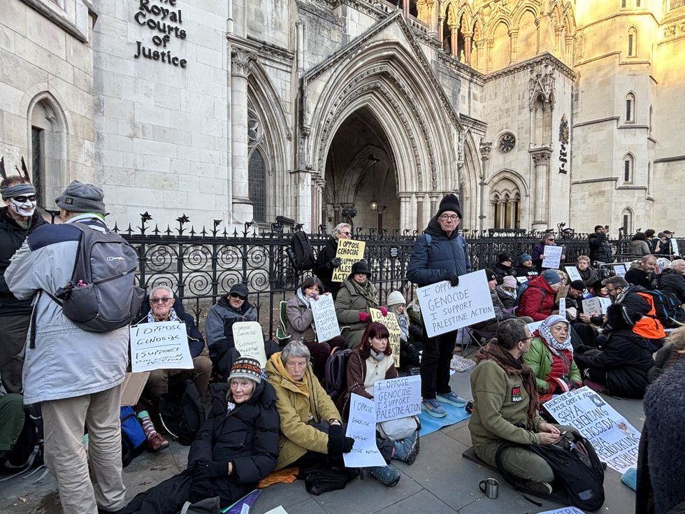 Palestine Action supporters, outside Royal Courts of Justice in central London, where the judicial review of Government's proscription of Palestine Action is taking place. Picture date: Wednesday November 26, 2025.