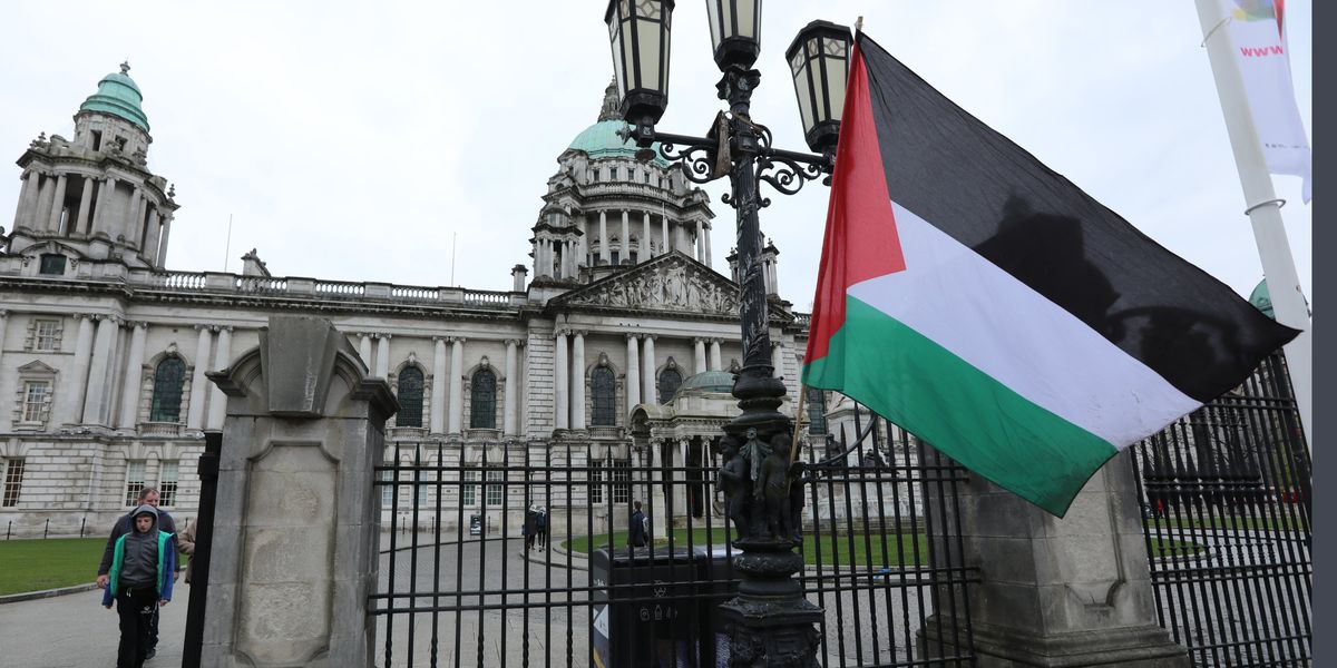 Palestine flag hoisted outside UK city hall as police forced to swoop in Palestine flag hoisted outside UK city hall as police forced to swoop in