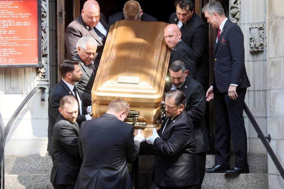 Pallbearers carry the casket of Ivana Trump, socialite and first wife of former U.S. President Donald Trump, during her funeral at St. Vincent Ferrer Church, in New York City, U.S., July 20, 2022. REUTERS/Brendan McDermid