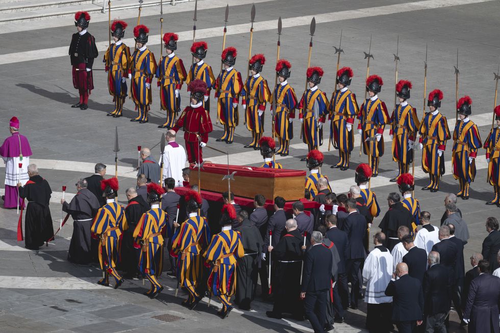 Pallbearers carry the coffin of the late Pope Francis to St. Peter's Basilica