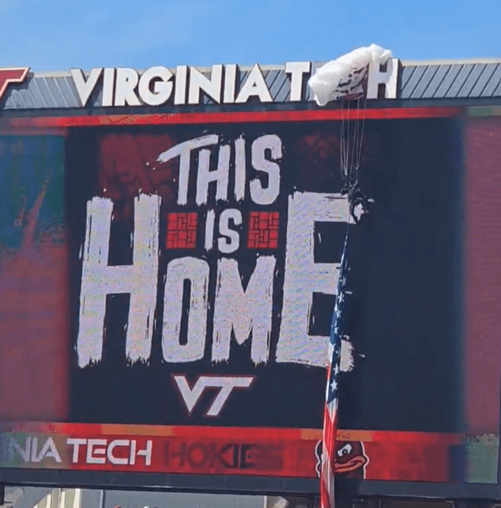 Parachuter stranded on Virginia Tech scoreboard