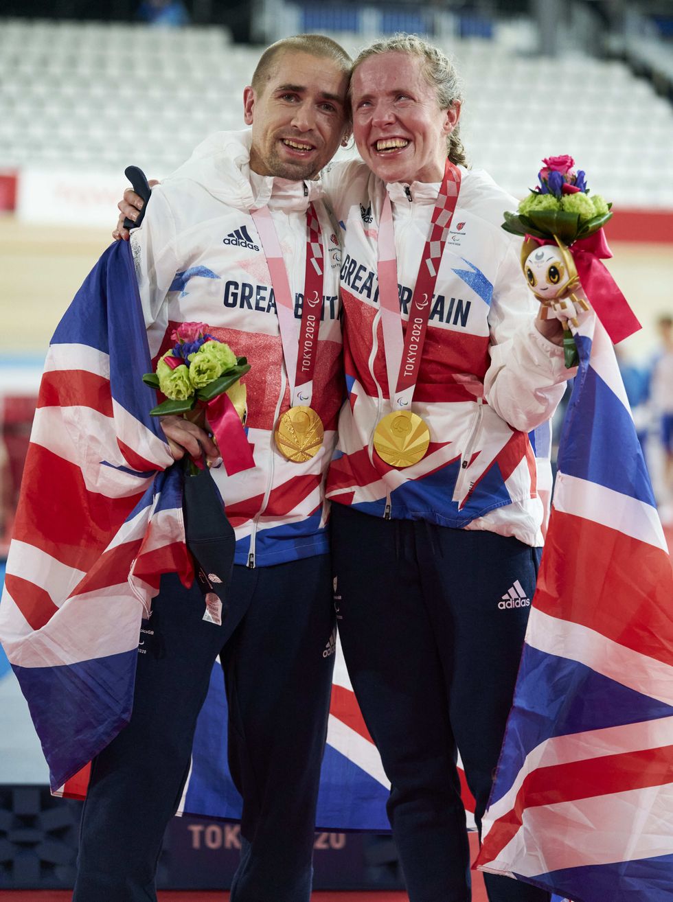 ParalympicsGB Cyclists, Lora Fachie celebrating gold medal with husband Neil Fachie.