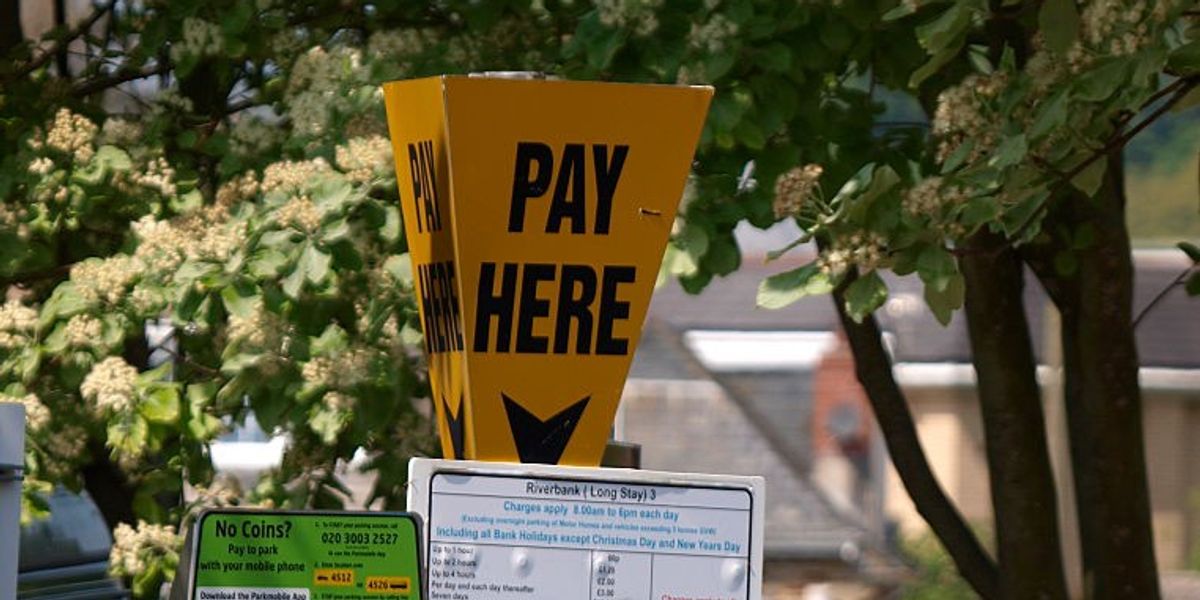 NextImg:Parking row erupts as woman fined for 'six minute' mistake but she claims she was 'misled' by sign