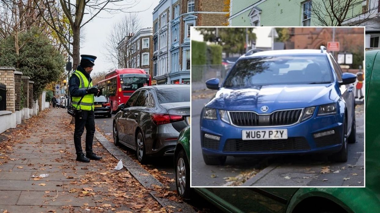 Parking warden and a car parked on the pavement