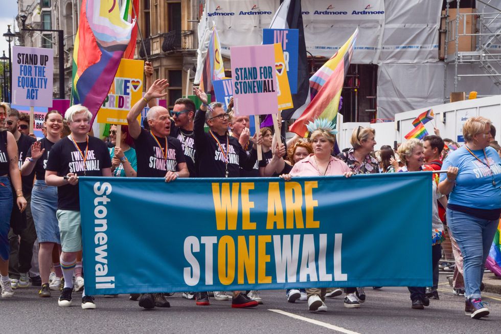 Participants hold a 'We are Stonewall' banner during this year's Pride in London Parade