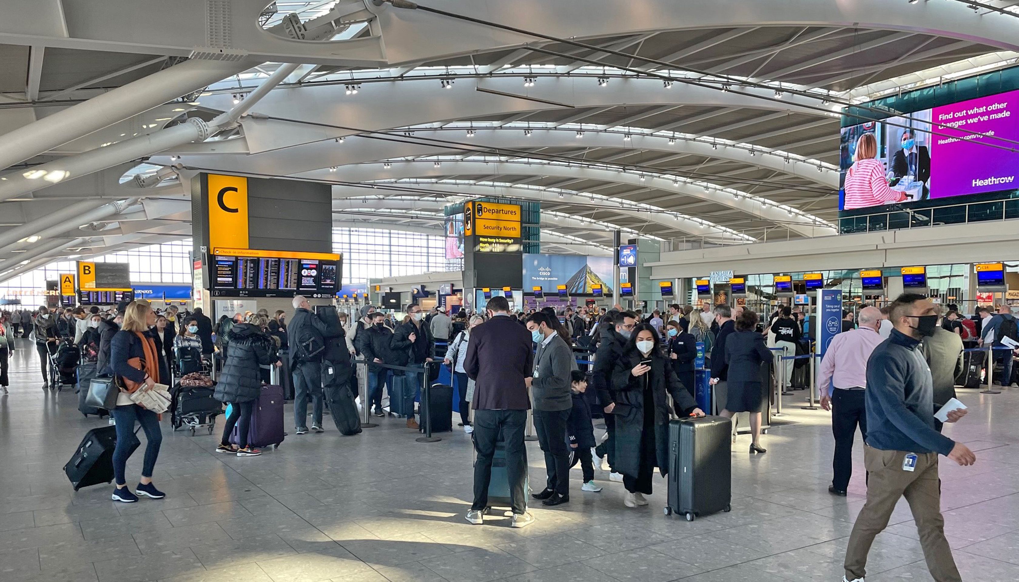 Passengers at Heathrow Airport T5, London. Picture date: Saturday February 26, 2022.