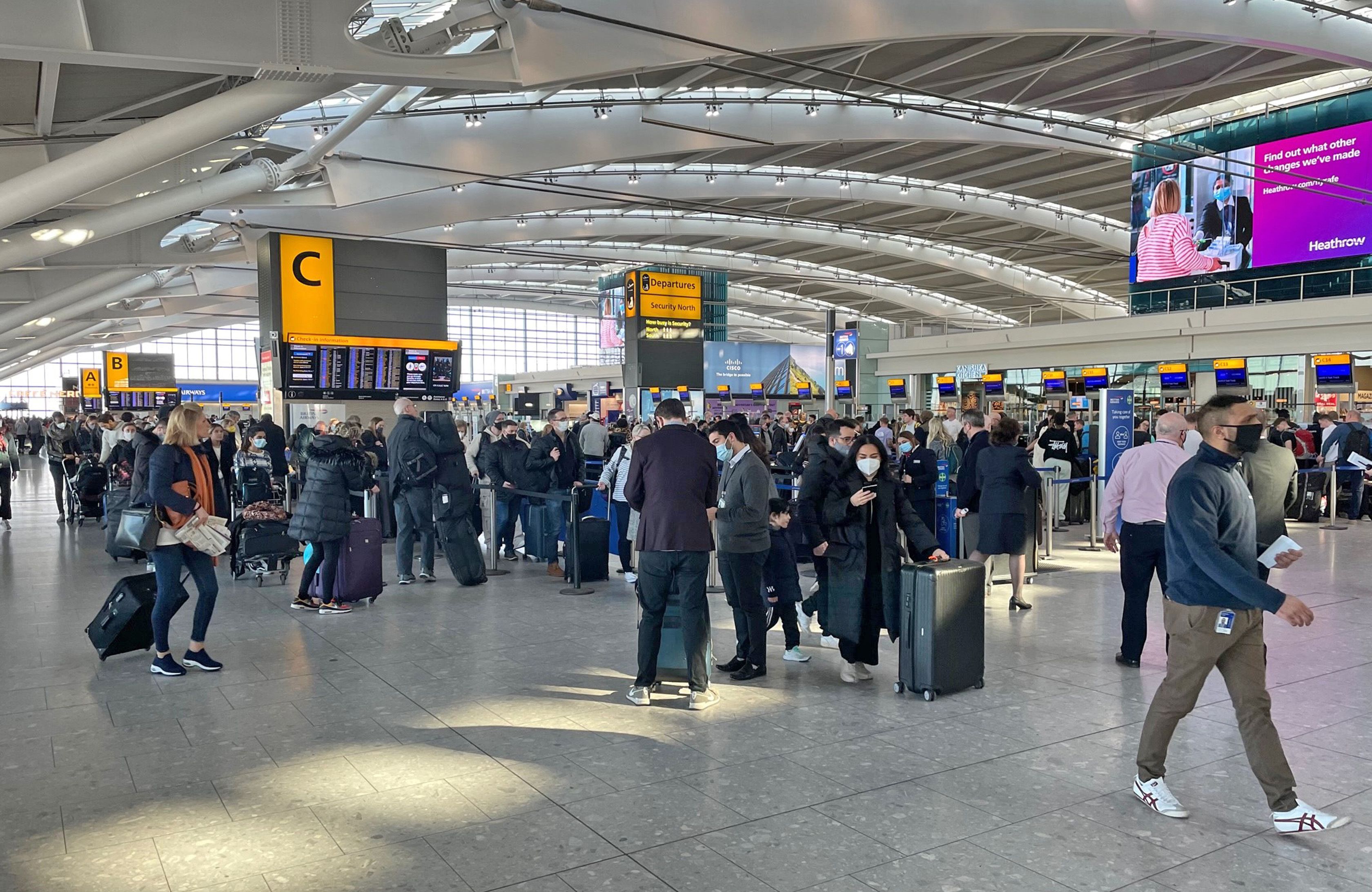 Passengers at Heathrow Airport T5, London