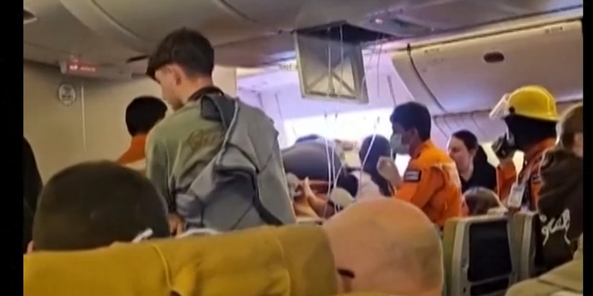 NextImg:WATCH: Passengers carried out of flight SQ321 after making emergency landing in Bangkok