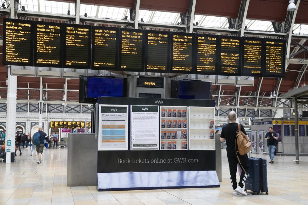 Passengers in Paddington Station in London, as train services continue to be disrupted following the nationwide strike by members of the Rail, Maritime and Transport union along with London Underground workers in a bitter dispute over pay, jobs and conditions. Picture date: Thursday June 23, 2022.