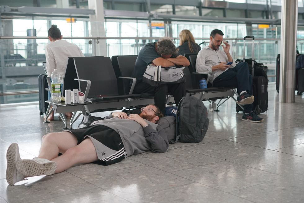 Passengers waiting at Heathrow airport