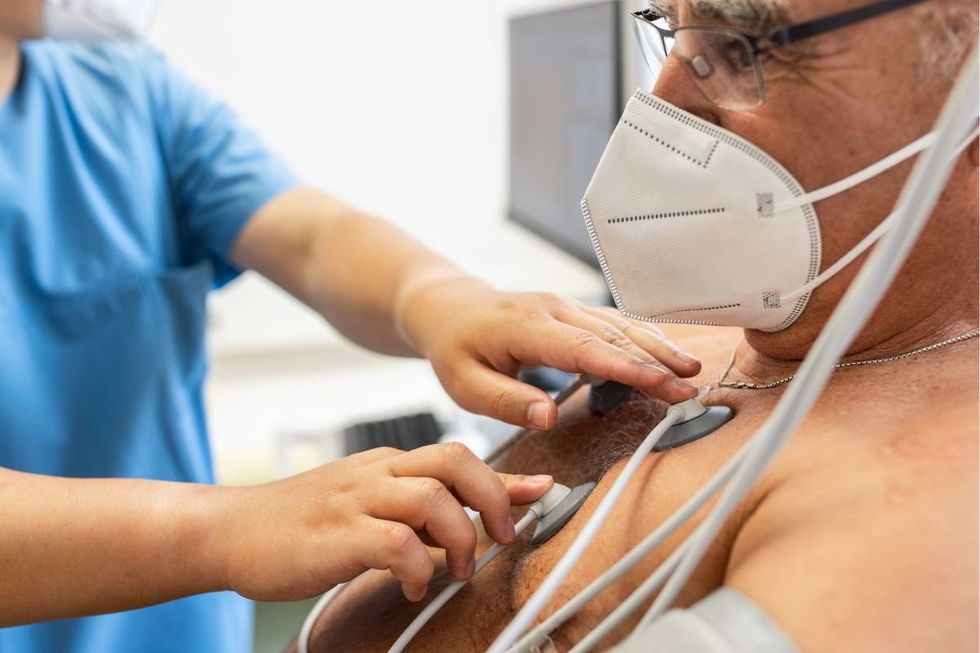 PATIENT GETTING HEART CHECKED