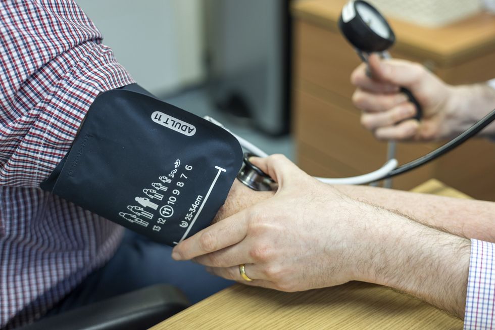 Patient getting their blood pressure taken