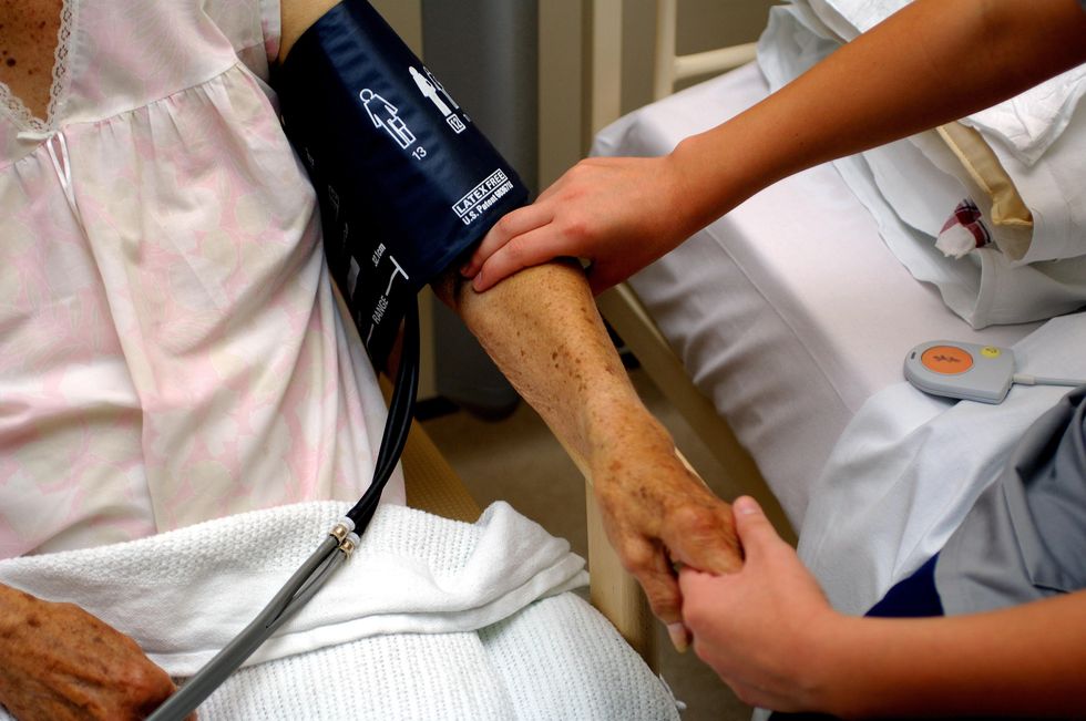 Patient receiving care from a nurse