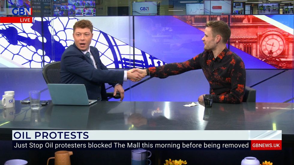 Patrick Christys joked his hand would be glued together with environmental activist's James Skeet