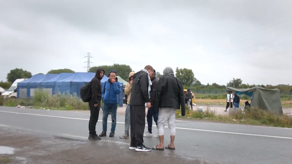 Patrick Christys speaks to migrants