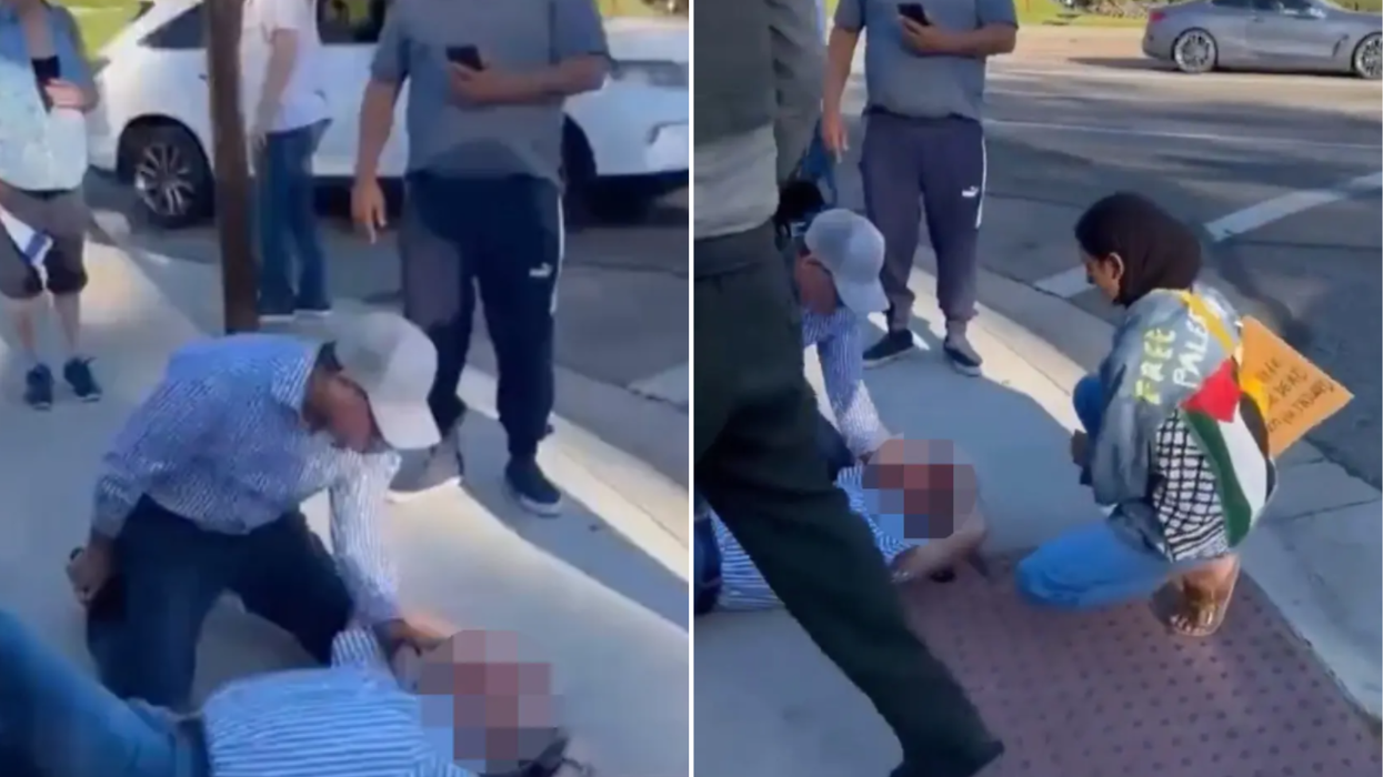 Paul Kessler (blurred) on the ground after hitting his head