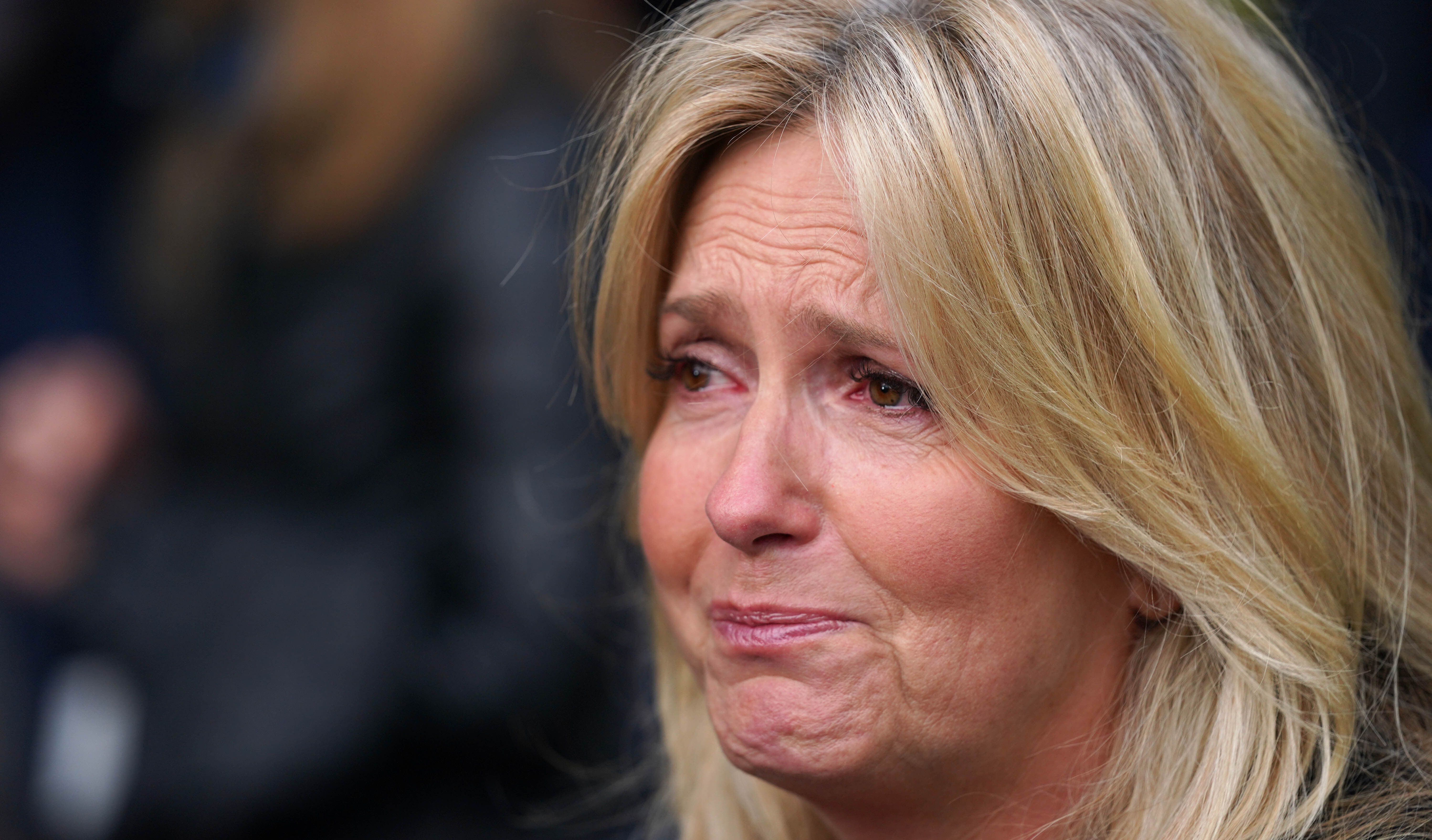 Penny Lancaster wipes a tear from her eye as she talks to the media about the menopause outside the Houses of Parliament in London during a protest against ongoing prescription charges for HRT (Hormone replacement therapy).
