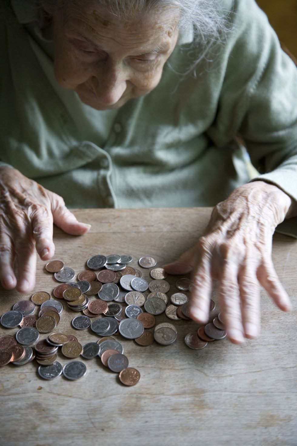 Pensioner counting pennies