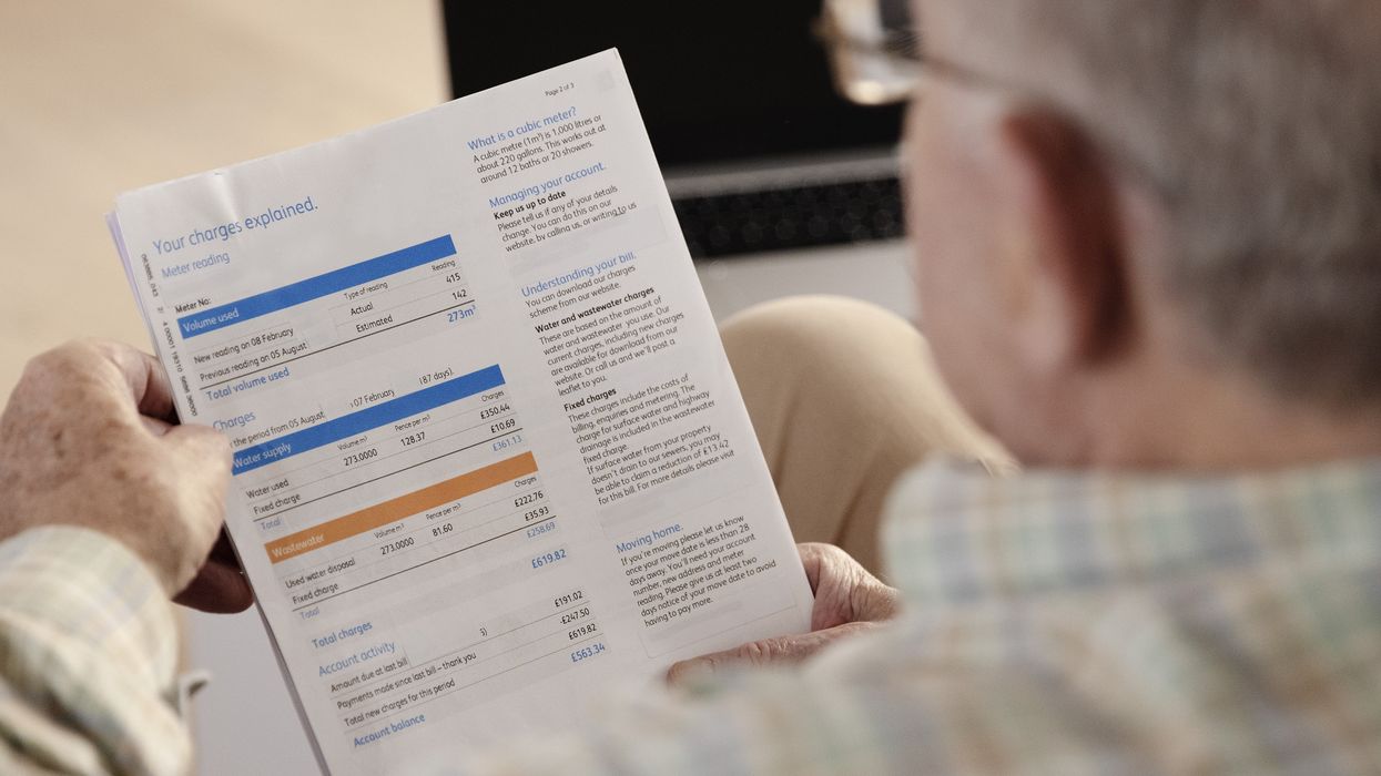 Pensioner looks at energy bills