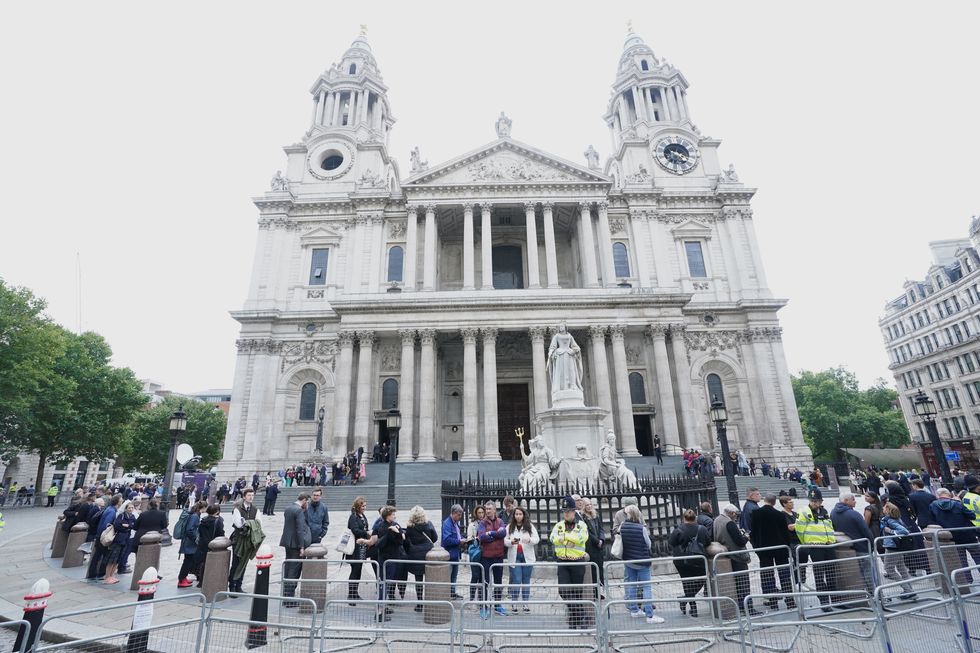 People arriving for the Service of Prayer and Reflection at St Paul's Cathedral, London, following the death of Queen Elizabeth II on Thursday. Picture date: Friday September 9, 2022.