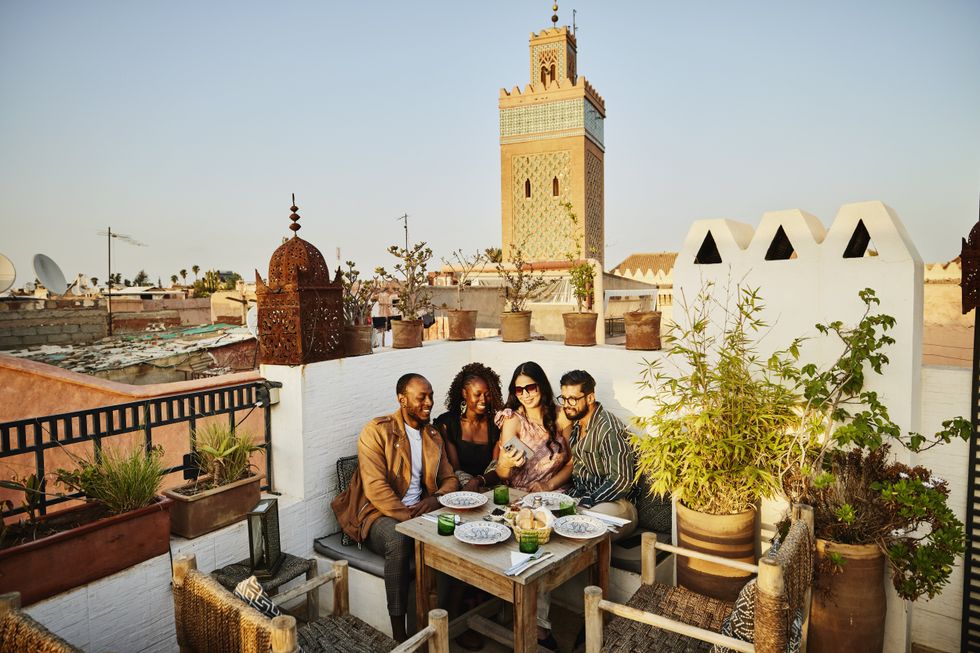 People at rooftop restaurant in the Medina, Marrakesh, Morocco