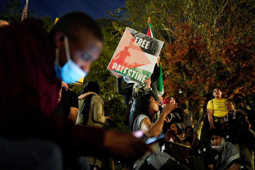 People attend a demonstration to express solidarity with Palestinians in Gaza