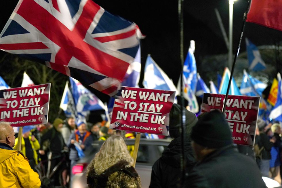 People attend a rally outside the Scottish Parliament in Edinburgh following the decision by judges at the UK Supreme Court in London that the Scottish Parliament does not have the power to hold a second independence referendum. Picture date: Wednesday November 23, 2022.