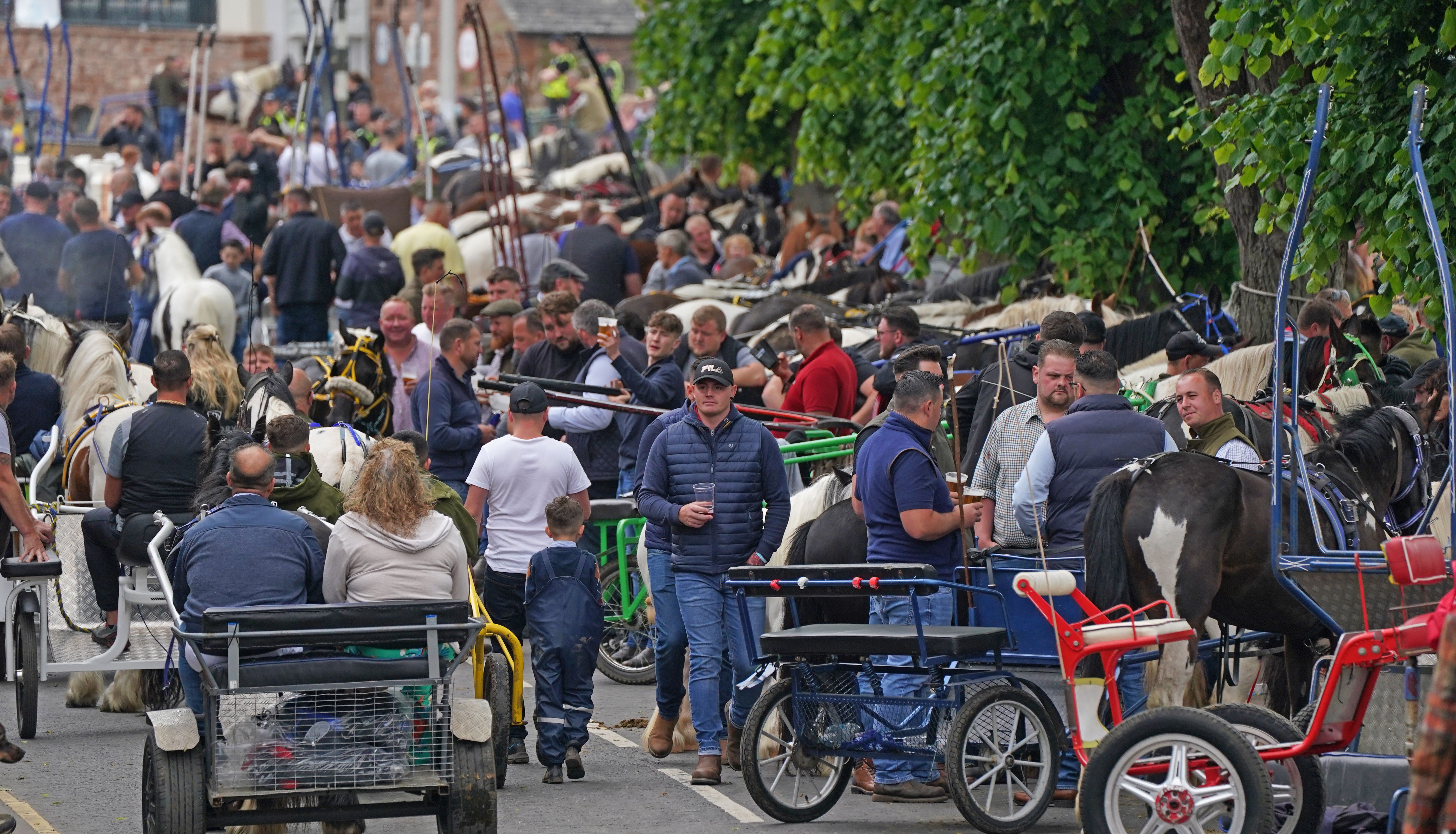 People attend the Horse Fair in Appleby, Cumbria, the annual gathering of gypsies and travellers. Picture date: Thursday June 9, 2022. Photo credit should read: Owen Humphreys/PA Wire