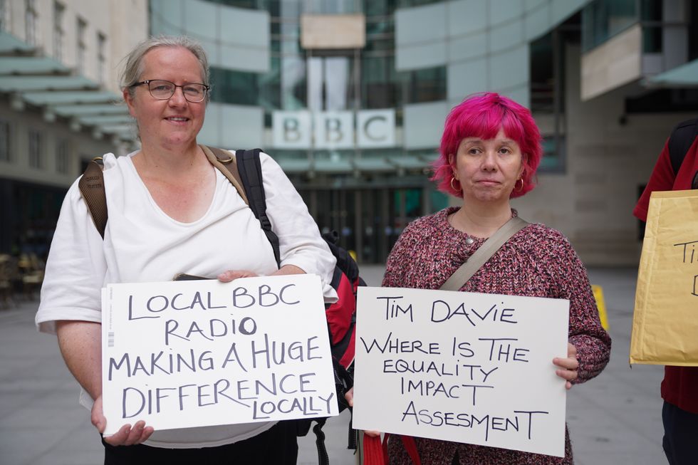 People demonstrate against the BBC's plans to cut local radio stations, outside BBC Broadcasting House in London