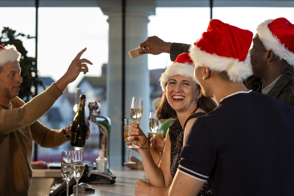 People drinking at a Christmas party