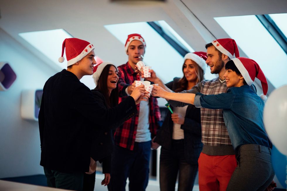 People drinking at a Christmas party