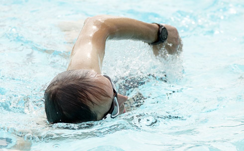 People enjoy the hot weather at Hathersage open air swimming pool at Hope Valley, near Sheffield. Temperatures are predicted to hit 31C across central England on Sunday ahead of record-breaking highs next week. Picture date: Sunday July 17, 2022.