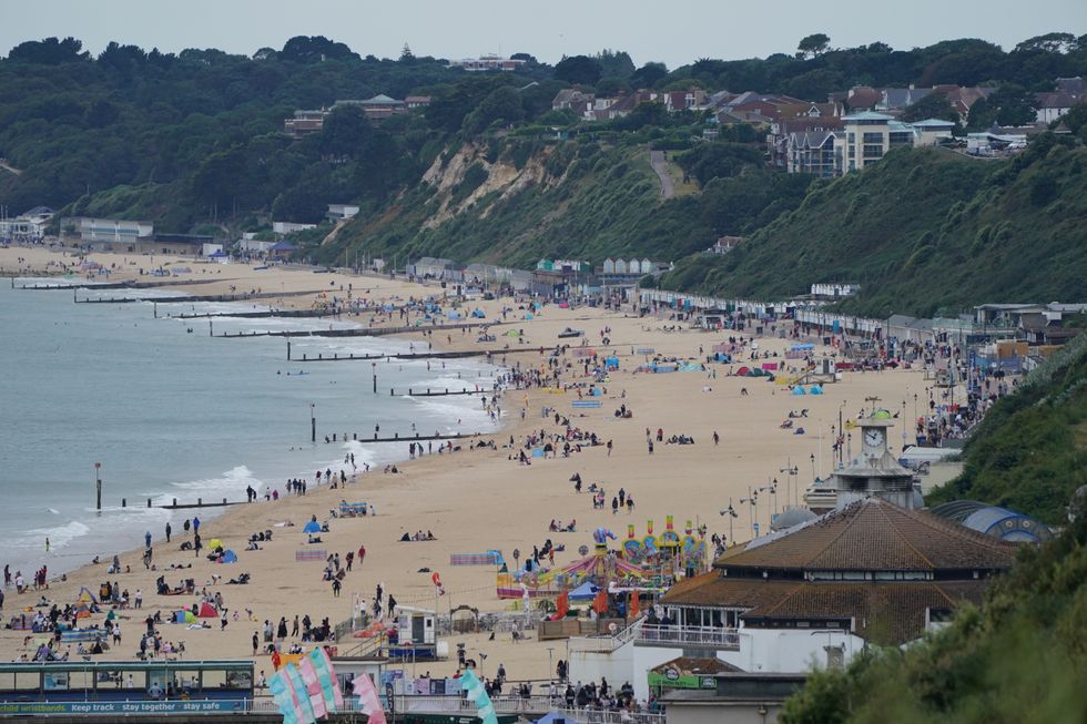 People enjoying the Bank Holiday weather on Bournemouth beach.